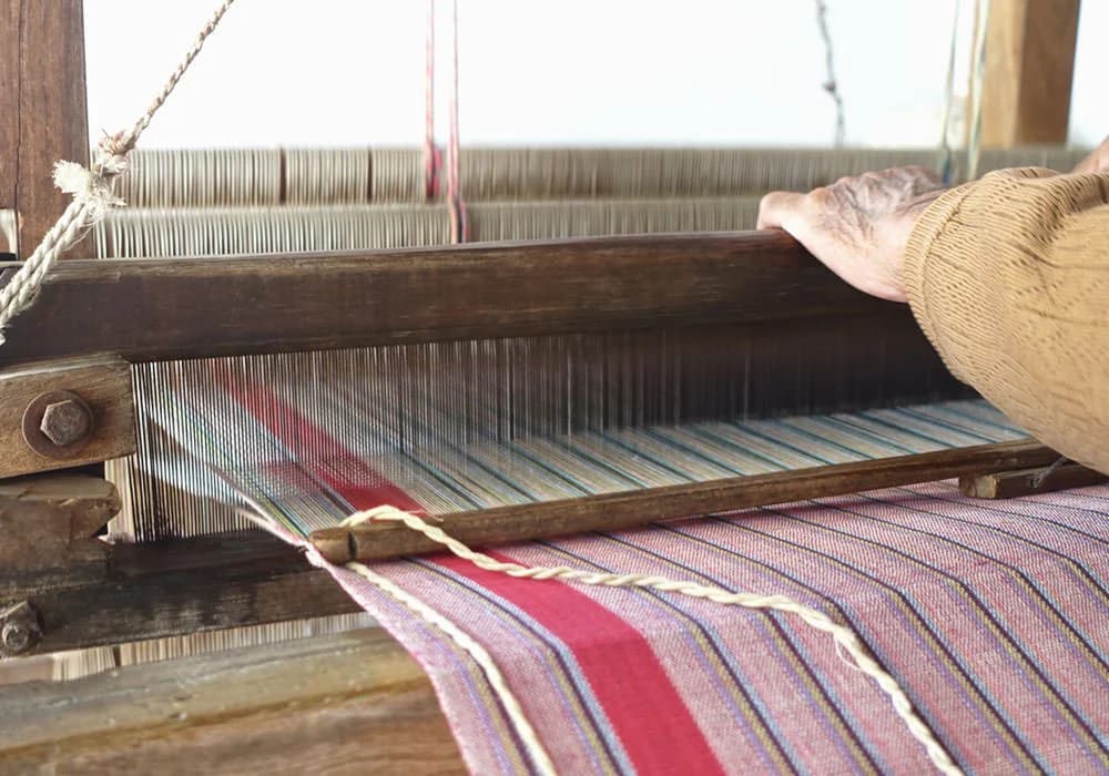 Authentic Bengal handloom fabric being inspected